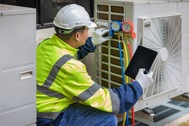 Professional Air Conditioning Repair technician working in South Grafton, MA